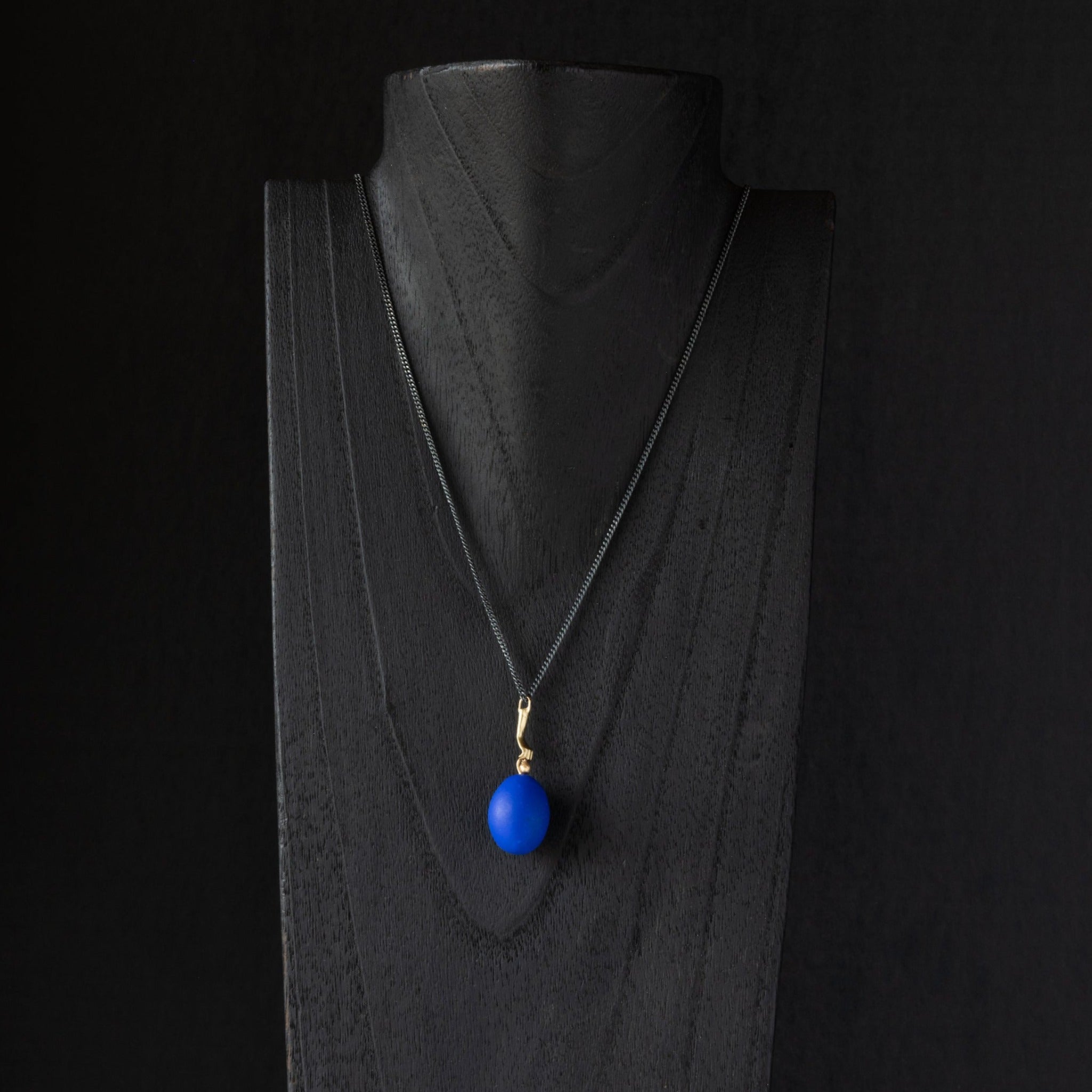 Egg In Hand Necklace