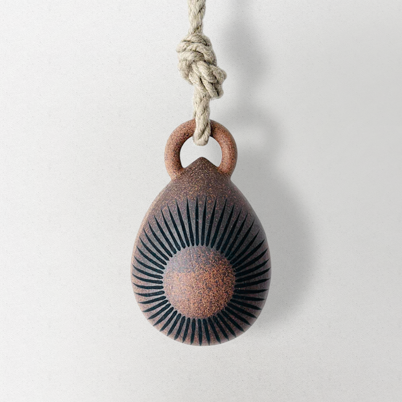 Tucker seed bell, sun and crescent